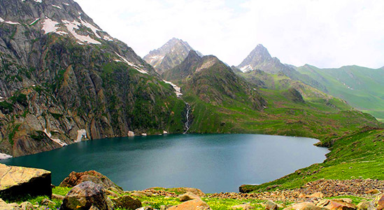 Beautiful lake in lap of surrounding hills in kashmir